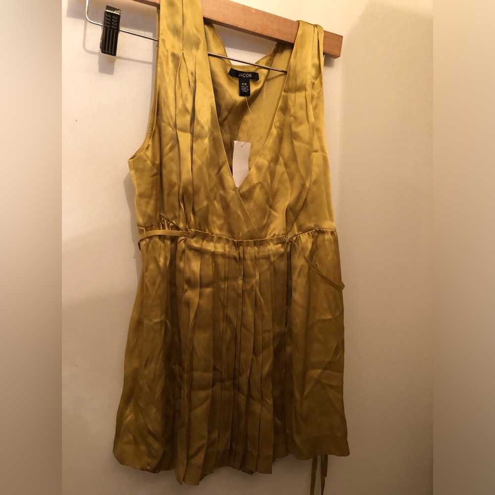 Jacob 100% silk camisole in gold/ mustard with tie and size zipper. Size small.